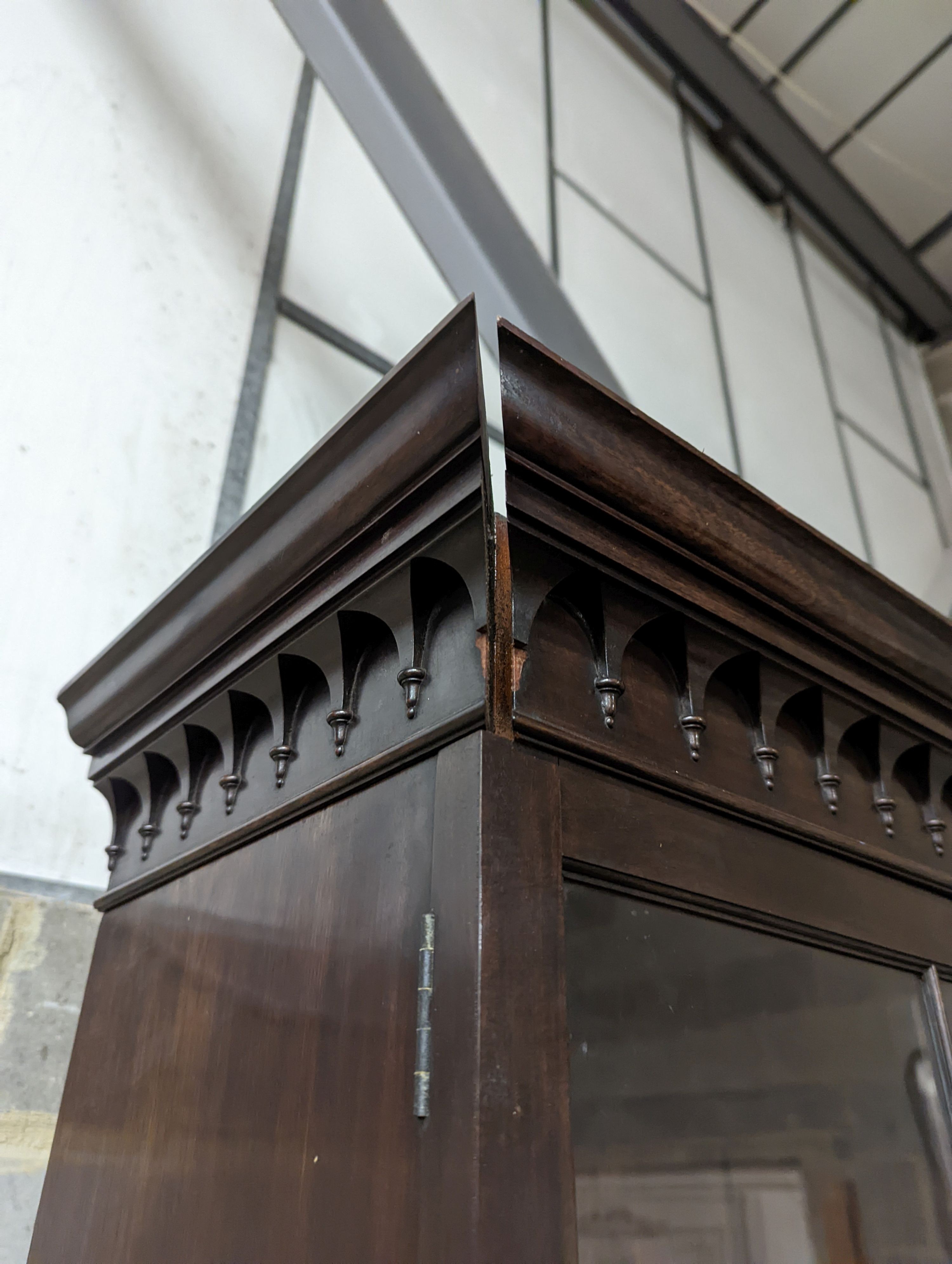 An Edwardian George III style glazed mahogany bookcase, width 113cm, depth 47cm, height 225cm